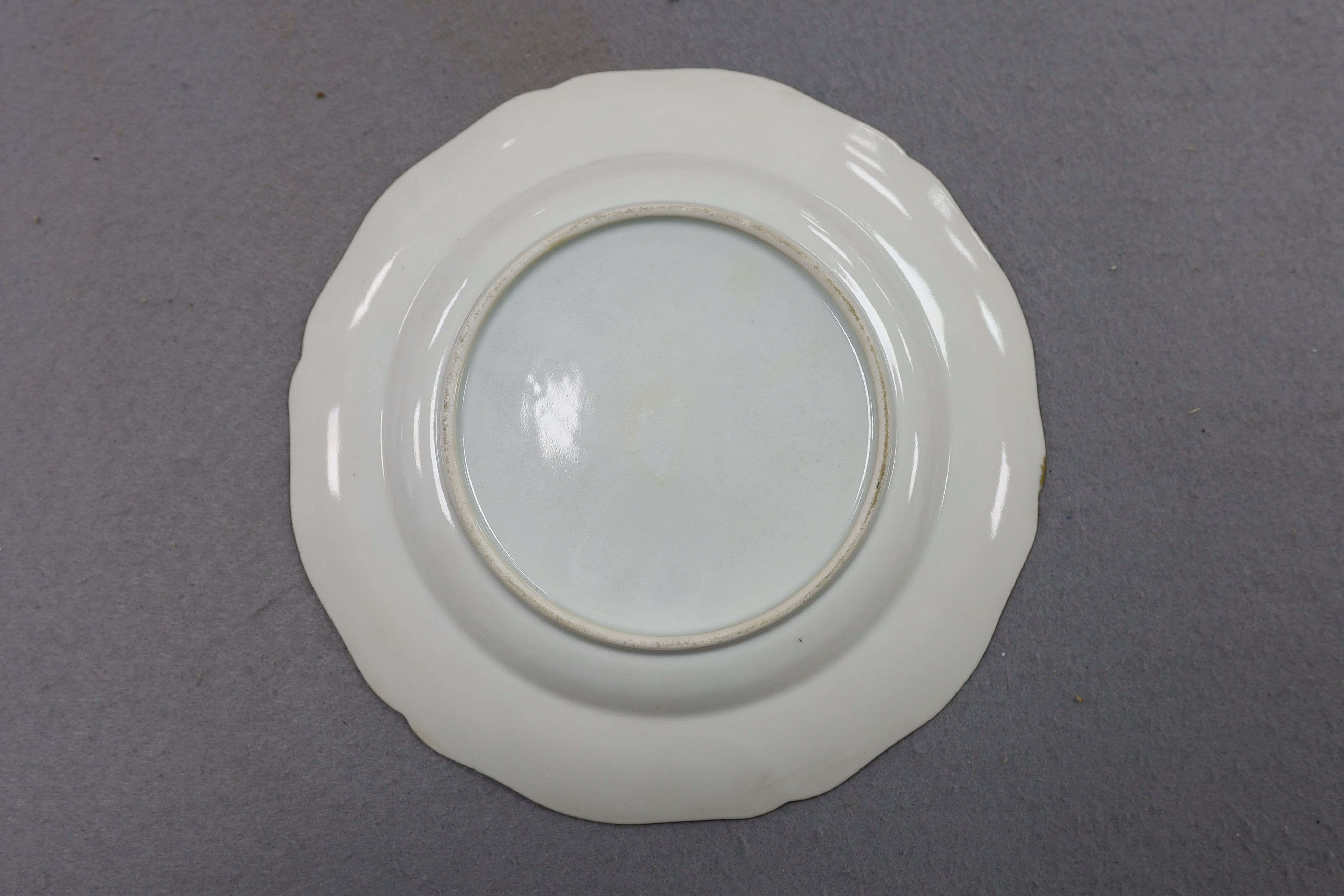 Two fine Chinese famille rose fencai dishes, 19th century, 24cm diameter